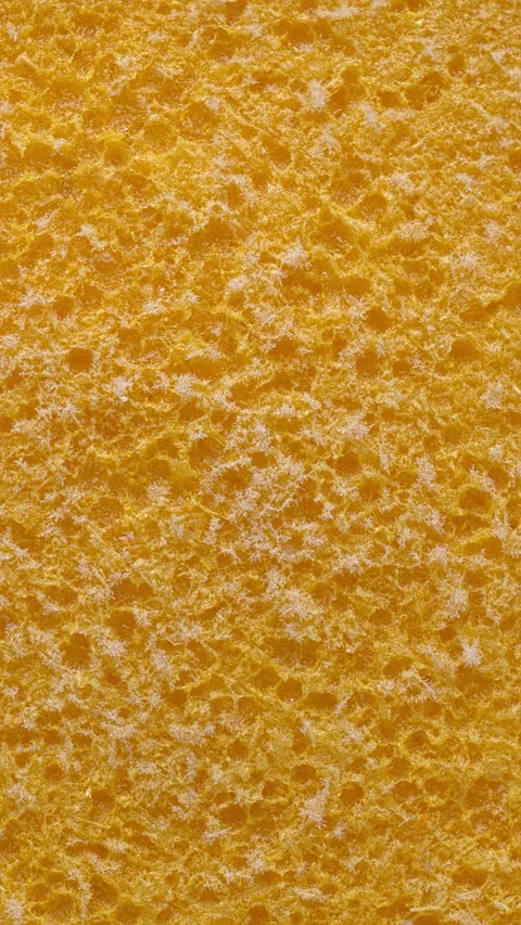 Frozen orange mousse background texture. Table spin. Vertical video. Stock Footage 310624478