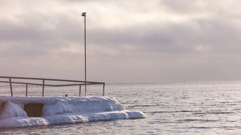 Frozen pier on the lake Stock Footage 87771233