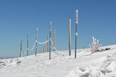 Frozen pilars with rope Stock Photos