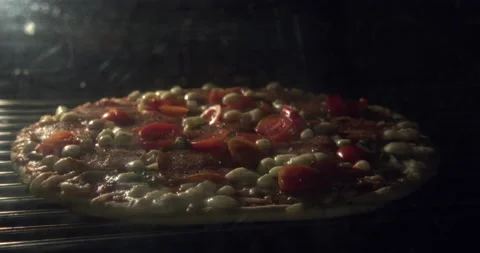 Frozen Pizza Timelapse on oven 6k 動画素材 213554422