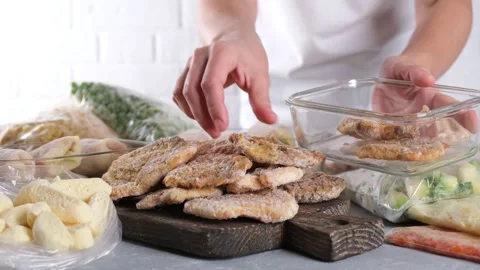 Frozen pork neck chops meat and pork schnitzel on the table Stock Footage 149619485