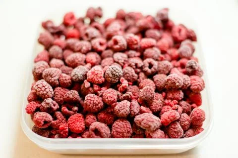 Frozen raspberries Stock Photos