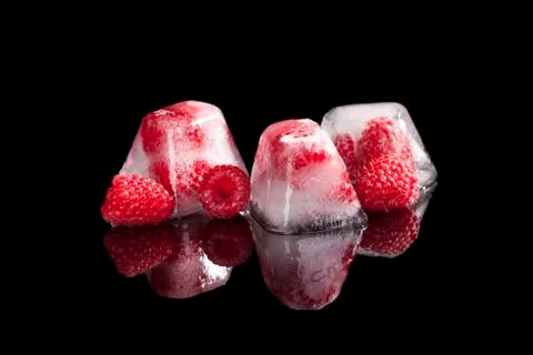 Frozen raspberries. Stock Photos