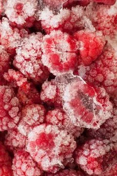 Frozen raspberries Stock Photos