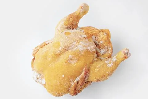 Frozen raw farm chickens, lying on a clean surface, ready to cook or proces.. Stock Photos
