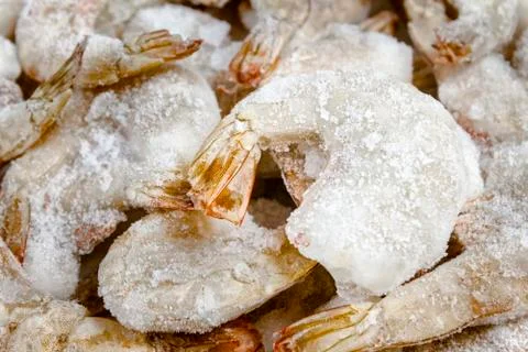 Frozen raw prawns background Stock Photos