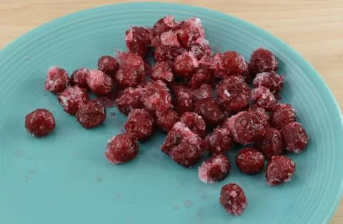Frozen raw red cherries Stock Photos