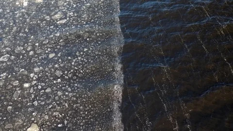 Frozen river in aerial view Video stock 126422157
