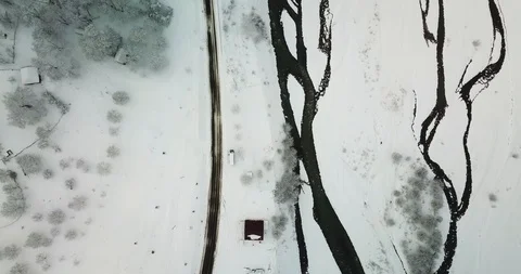 Frozen River and road Overhead Aerial Footage Stock Footage 125793052