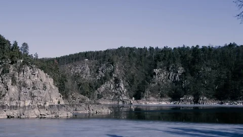 Frozen river and rocks. Time lapse. Stock Footage 106719372