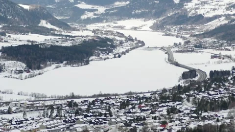 Frozen river and snowy valley below Hafjell, Norway Vídeo Stock 240439710