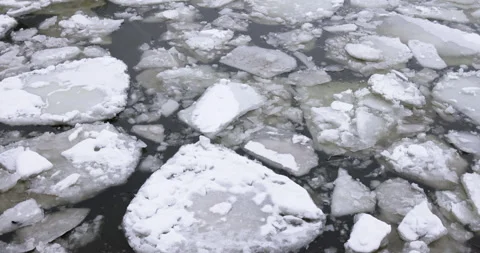 Frozen river with blocks of ice in winter Stock Footage 262983239