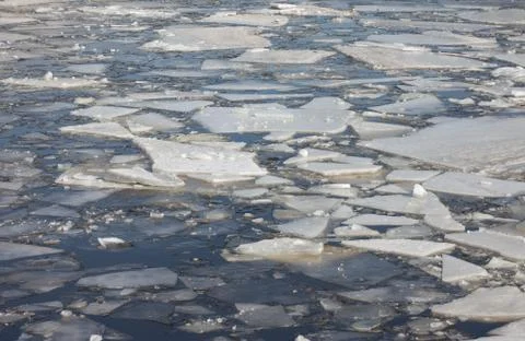 Frozen river with  chunks of ice Stock Photos