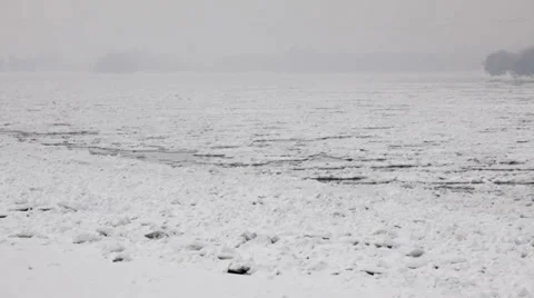 Frozen river Danube at winter - ice floating over river surface Stock Footage 35956435