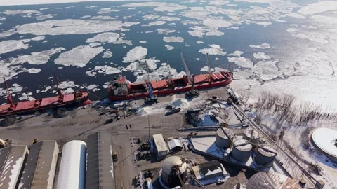 Frozen river ice texture aerial winter canada Stock Footage 329452697
