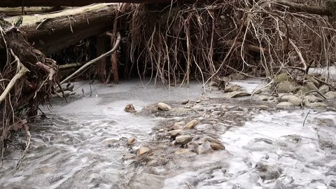 Frozen river with ice on the top Stock Footage 102388622