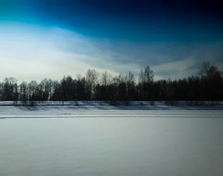 Frozen river landscape background Stock Photos