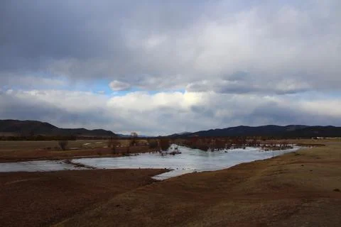 Frozen river landscape in springtime Stock Photos