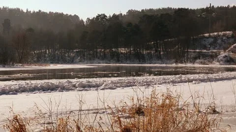 Frozen river neris in  floating floe. cars going in distance Stock Footage 16776512