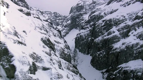 Frozen river in the snow-capped mountain ranges, Through Gorge To Dam And Over Stock Footage 108600460