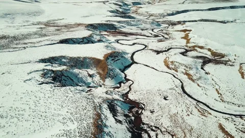 Frozen river through an icy landscape in Iceland Stock Footage 154852885