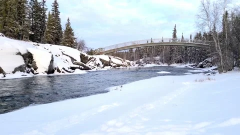 Frozen river unber bridge Stock Footage 142770616