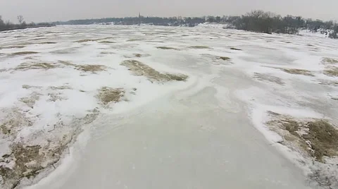 Frozen river very low angle moving across ice Stock Footage 49748060