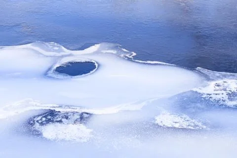 Frozen river in winter Stock Photos
