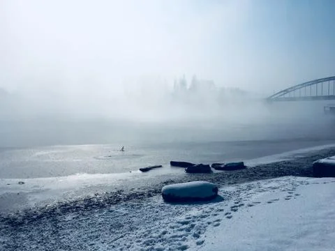 Frozen river in winter. Stock Photos