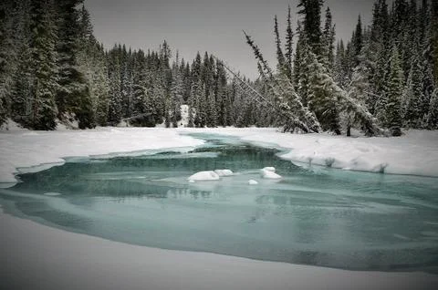 Frozen river winter scene. Stock Photos
