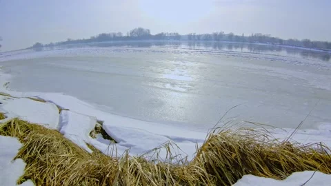 Frozen Riverbank on a winter day Stock Footage 150186576