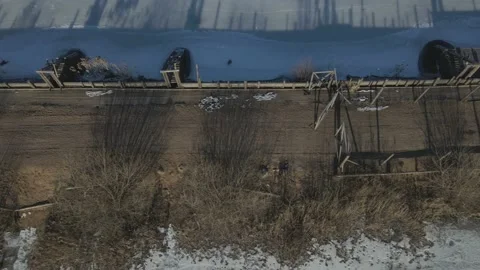Frozen road with barbed wire Stock Footage 221142711