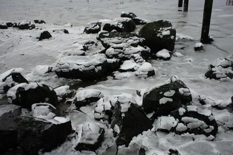 Frozen rocks Stock Photos