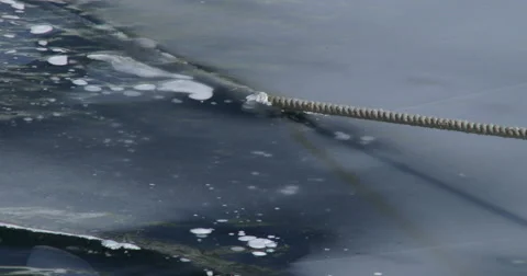 Frozen rope on docked boat Stock Footage 47479848