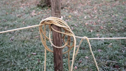 Frozen rope wrapped around a post Stock Footage 120952634