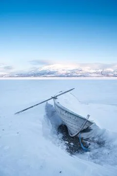 Frozen rowing boat Stock Photos