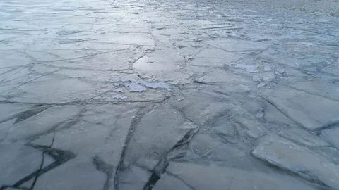 Frozen sea ice sheet in winter aerial shot Stock Footage 87600954