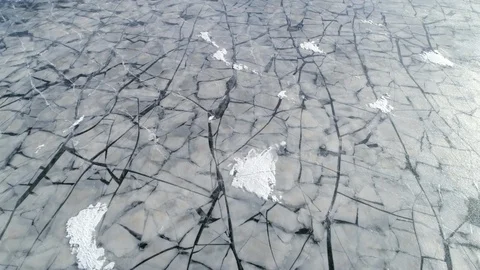 Frozen sea ice surface pattern in winter aerial shot Stock Footage 87640529