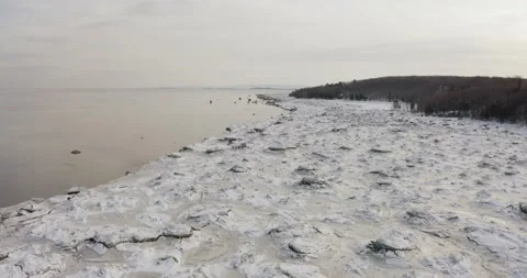 Frozen shoreline in winter from drone Video stock 151862383