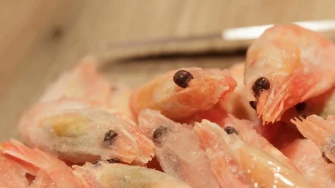 Frozen shrimps, ready for cutting Stock Footage 74805277