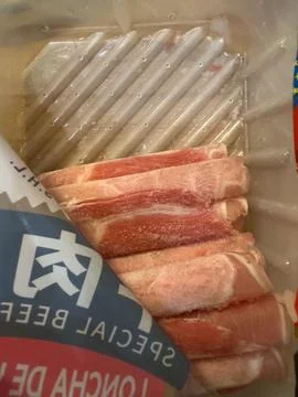 Frozen sliced beef packaging for hot pot cooking Stock Photos