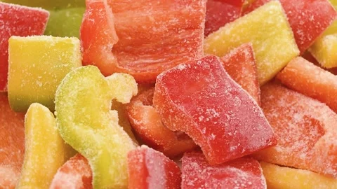 Frozen sliced ​​sweet peppers, rotating video Stock Footage 342188661