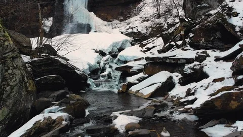Frozen small river in mountains Stock Footage 89710065