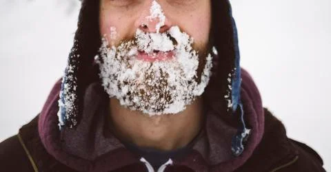 Frozen snow on the beard Stock Photos