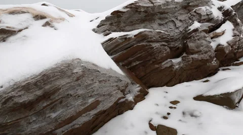 Frozen snow covered rocks Stock Footage 34006293