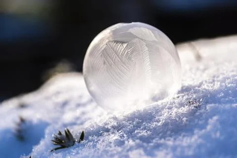 Frozen soap bubble with delicate structure and filigree patterns as a macro 스톡 사진