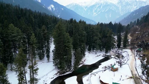 Frozen solitude in the Himalayas, as seen from above- Betaab valley Stock Footage 310657801