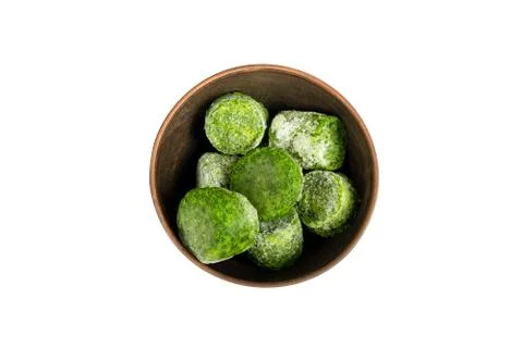 Frozen spinach on white background. Stock Photos