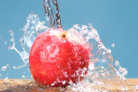 Frozen splash drop on apple Фото