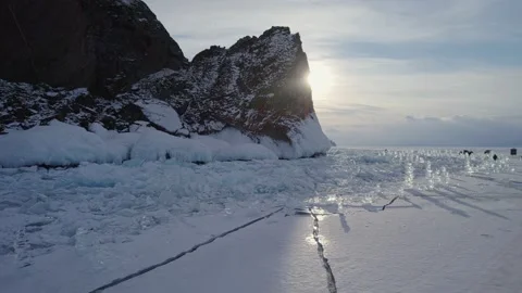 Frozen splashes of water at sunset Baikal lake Stock Footage 224329404